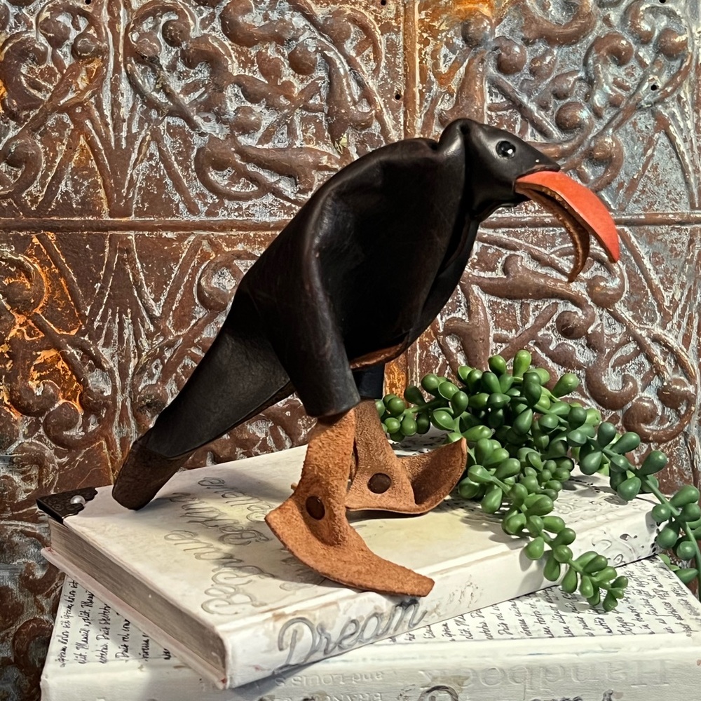 Vintage leather MCM blackbird; I believe this is a Deru Germany bird figurine